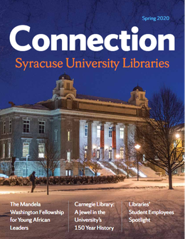 outside of Carnegie Library in the evening in winter, snow on ground